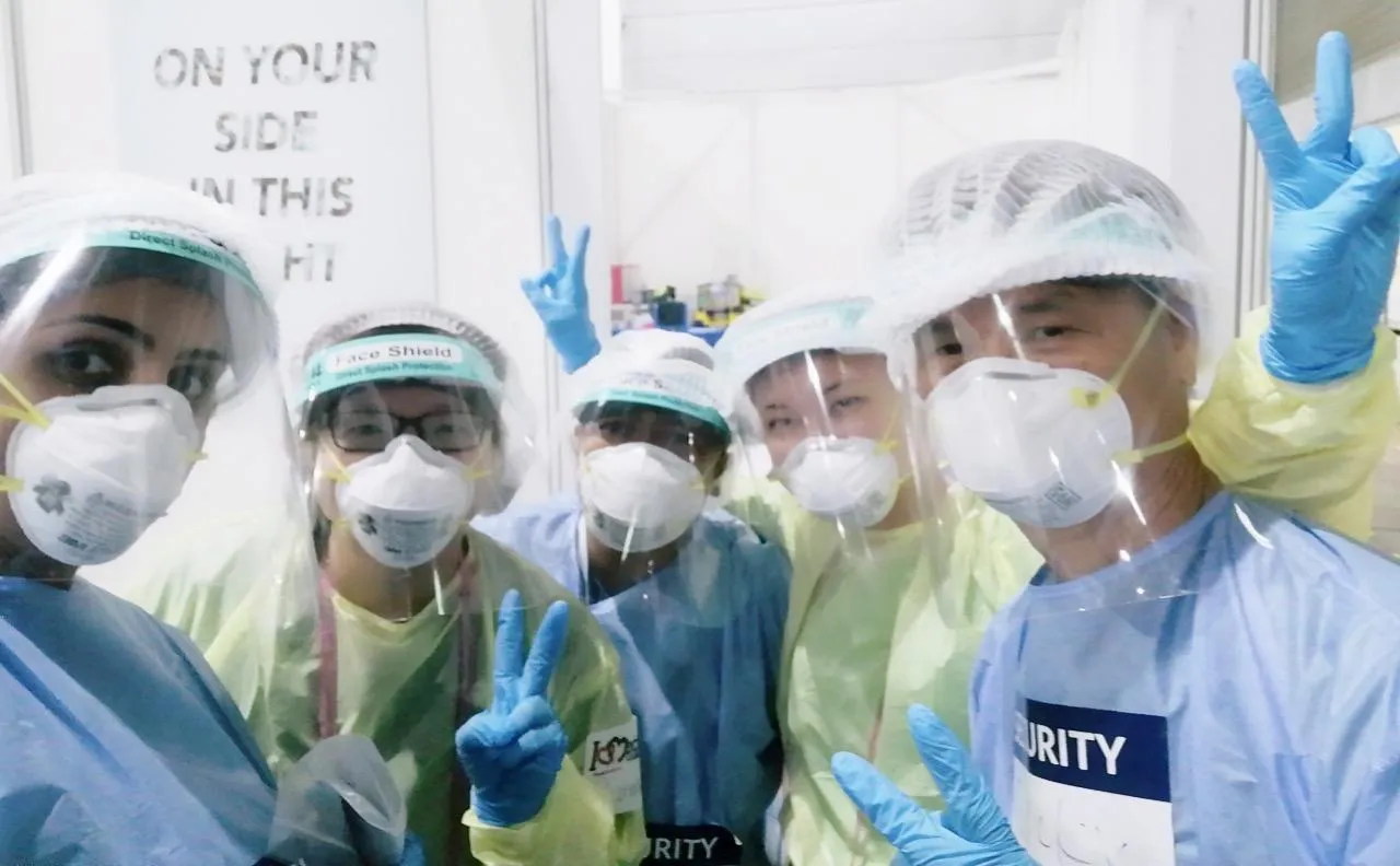 AMC personnel wearing protective equipment during pandemic-response work