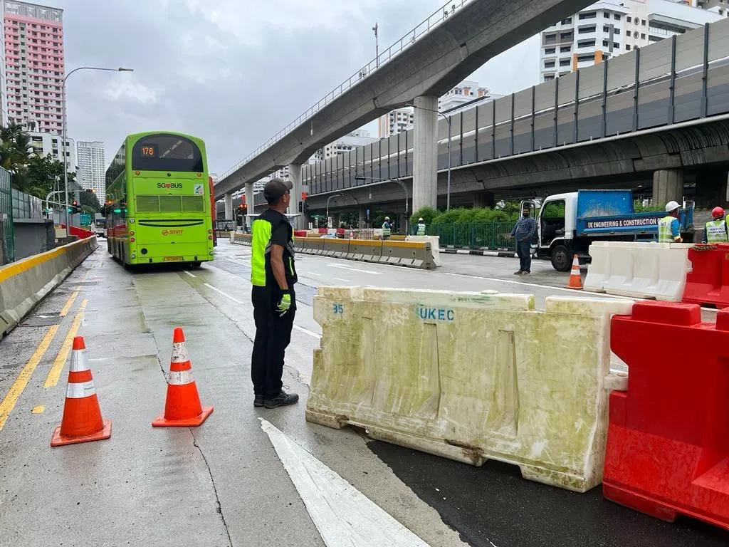 AMC traffic marshal at work at a construction site